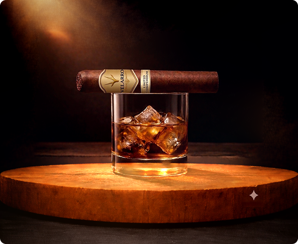 Whisky glass beside a cigar